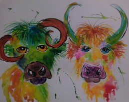 Two quirky colourful cows